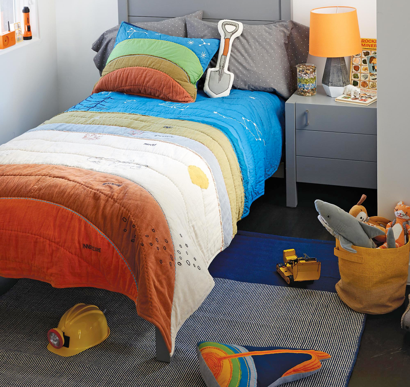 Illustration for article titled Your Kid Will Secretly Learn About Geology With this Colorful Bedding